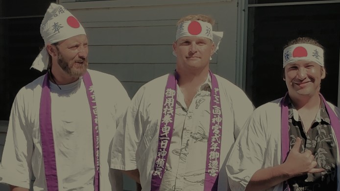 martial artists wear traditional costumes during Shinto Fall celebrations to show the spirit and health of the community.